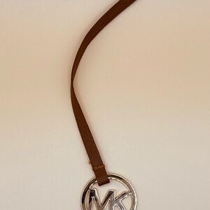 Michael Kors Gold bag charm with Brown Leather strap